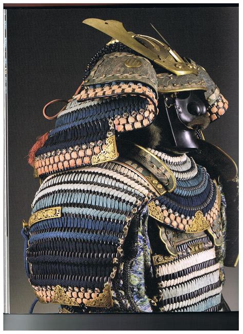 an elaborately decorated helmet with gold trimmings and metal scissors on it's back