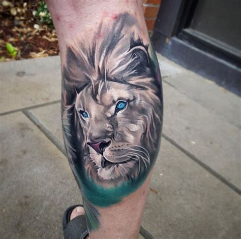 Blue-eyed lion tattoo by Tyler Malek | Lion tattoo, Lion canvas art ...