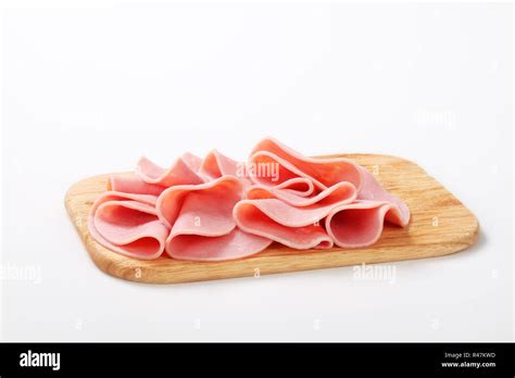 Thin slices of ham Stock Photo - Alamy