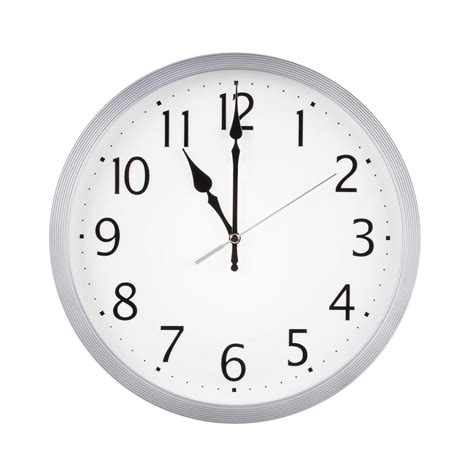 Eleven o'clock on a round clock 3586904 Stock Photo at Vecteezy