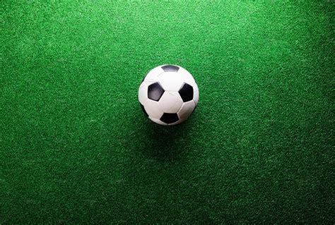 Soccer ball against artificial turf studio shot copy space featuring ...