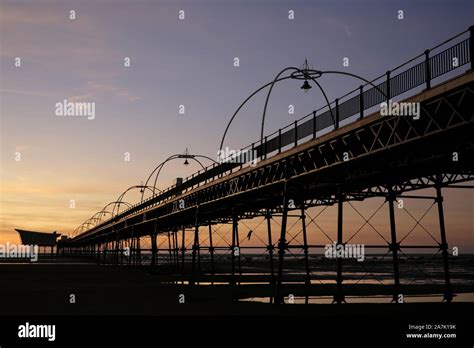 Southport Pier, UK, at dusk Stock Photo - Alamy