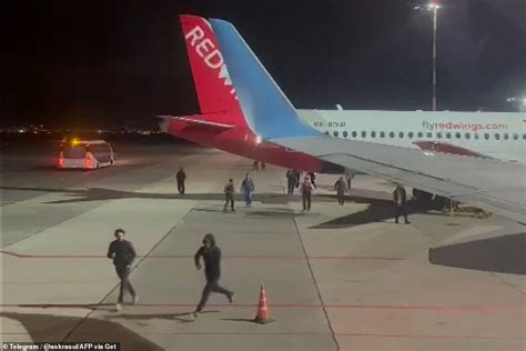 Plane targeted at Dagestan airport struck again by mob after diversion | Daily Mail Online