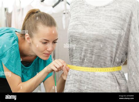 happy nice woman making a waist measurement Stock Photo - Alamy