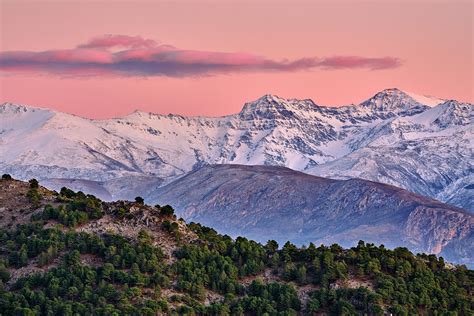 Sierra Nevada National park at pink sunset. Winter time. Spain Photograph by Guido Montanes ...