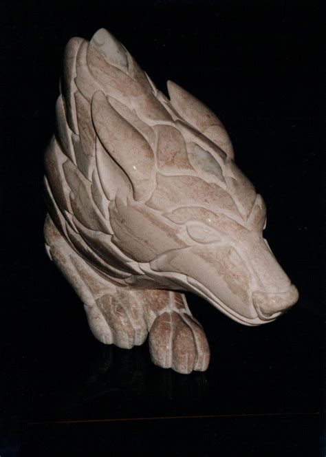 Wolf stone sculpture | Wood carving patterns, Sculpture, Wood sculpture