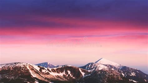 Purple Sunrise Light Glowing on Snowy Mountains Peaks Stock Photo - Image of snow, beautiful ...