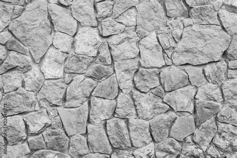 Grey stone wall texture. Ancient natural cobblestone road as background. Stock Photo | Adobe Stock