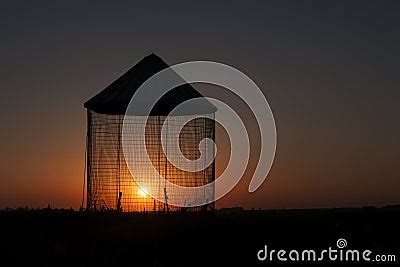 Grain Bin Sunset Silhouette Royalty Free Stock Photos - Image: 38262648