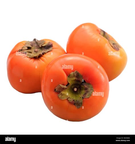 Persimmons, groups of orange color fruit isolated on white background Stock Photo - Alamy