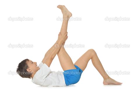 Boy exercising yoga — Stock Photo © aletia #47821267