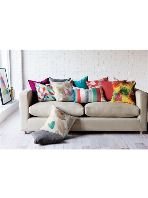 sofa with multicoloured cushions... Great to bring colour to a room and ...