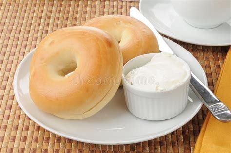 Bagels with cream cheese stock photo. Image of cheese - 25961336