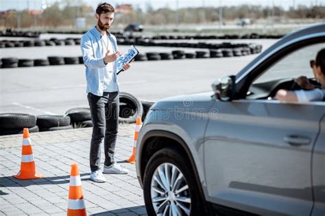 Instructor Teaching To Drive a Car on the Training Ground Stock Image - Image of road, exam ...