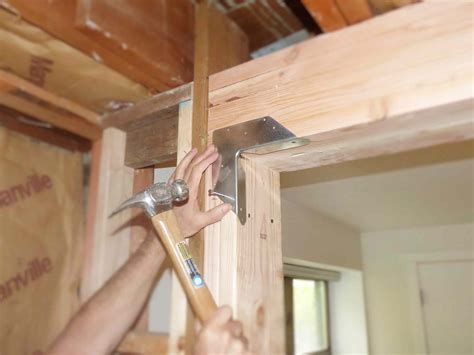 How to Replace a Load-Bearing Wall With a Support Beam