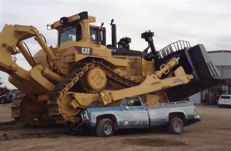 VIDEO: Watch this Caterpillar D11T annihilate an old pickup truck ...