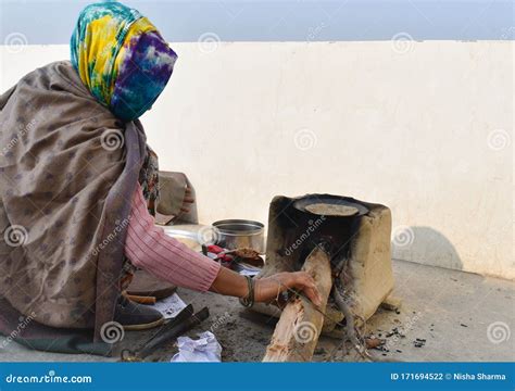 Woman Cooking Food on Wood Fire in Village of Haryana Stock Photo - Image of unidentifiable ...