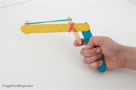 Make a Craft Stick Rubber Band Gun - Frugal Fun For Boys and Girls