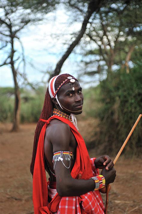 Masai Outdoors In Traditional Clothing by Christophe cerisier