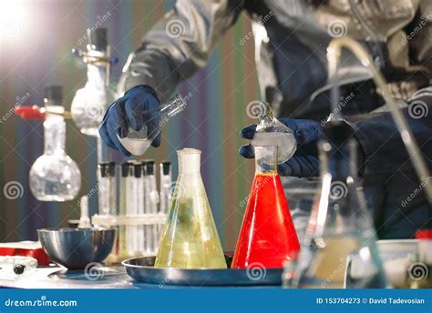 Experiments in a Chemistry Lab. Conducting an Experiment in the Laboratory Stock Image - Image ...