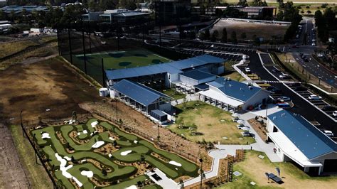 Swing City golf range opens at Norwest, The Hills | The Advertiser