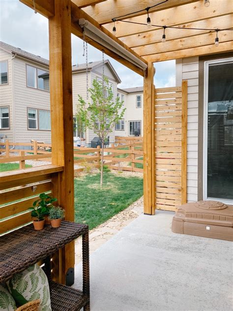 DIY Pergola: How to Build a Pergola on a Patio with Wood Slat Privacy Screen - Sprucing Up Mamahood