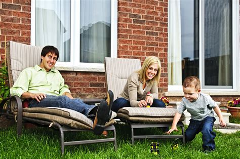 Happy family relaxing at home - Holiday Termite and Pest Control