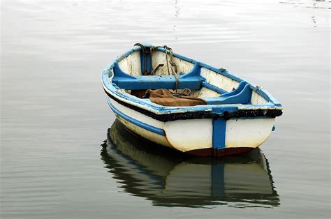 "boat on the water, reflection" by Stan Daniels | Redbubble