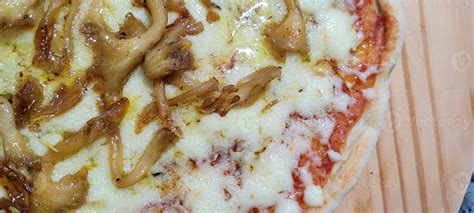 mushroom and cheese pizza with sauce 10643964 Stock Photo at Vecteezy