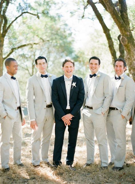 groomsmen in tan suits and groom in black via style me pretty | Sonoma wedding, Groom and ...