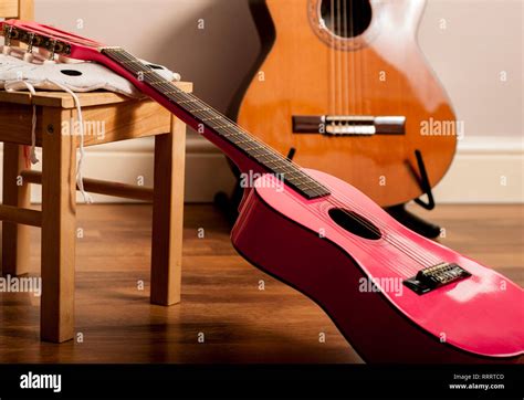 Pink guitar hi-res stock photography and images - Alamy