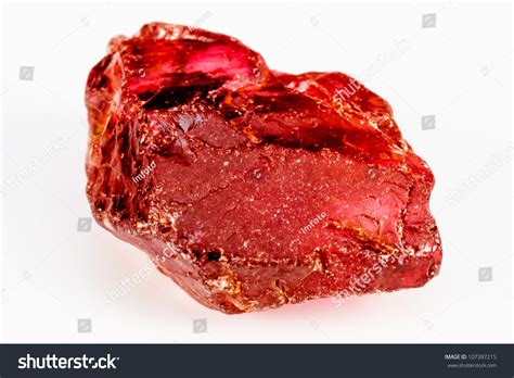 Uncut And Raw Garnet Crystal. This Natural Garnet Has A Crisp Reddish Color. Stock Photo ...