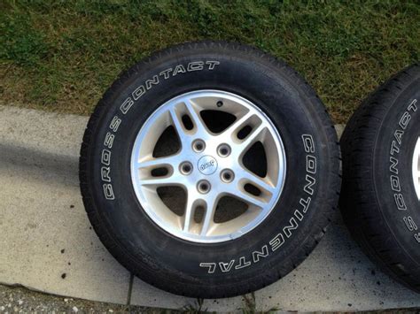 Purchase Jeep Grand Cherokee wheels & tires (4) in Highland, Michigan, US, for US $20.00