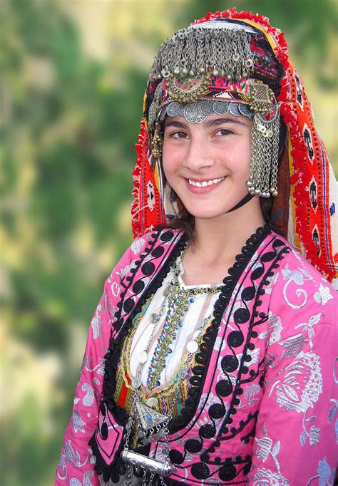 A Turkish folk dancer in a festive dress. | Turkish clothing, Folk ...