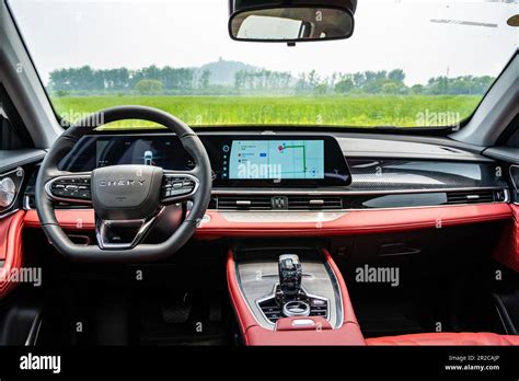 Front dashboard of a Chery Tiggo 7 Pro (badged at Tiggo 7 Plus for China) SUV car pictured ...