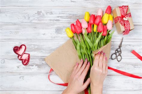 Premium Photo | Bouquet of spring tulips and gift