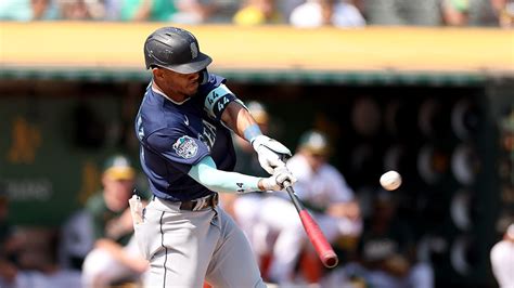 Mariners' Julio Rodriguez, fine after HBP, gets to 100 RBIs in style