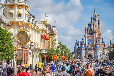 Main Street USA Clock Receives Golden Makeover, Sponsored 50th Anniversary Banners at Magic Kingdom