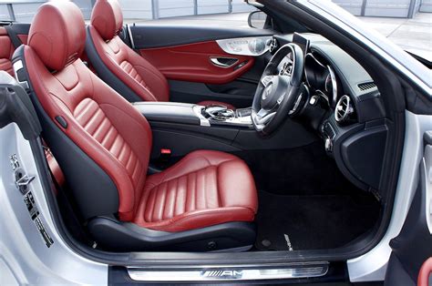 A Red and Black Car Interior with Red Leather Seat Covers · Free Stock Photo