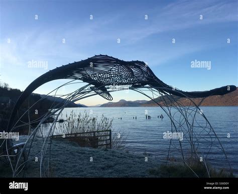 Loch Ness Monster Sculpture looking out over Loch Ness Stock Photo - Alamy