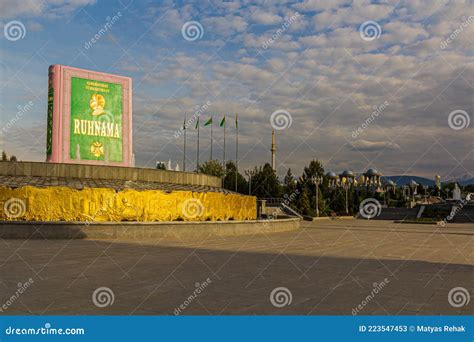 ASHGABAT, TURKMENISTAN - APRIL 17, 2018: Statue of Ruhnama, Book of the Soul, Written by ...