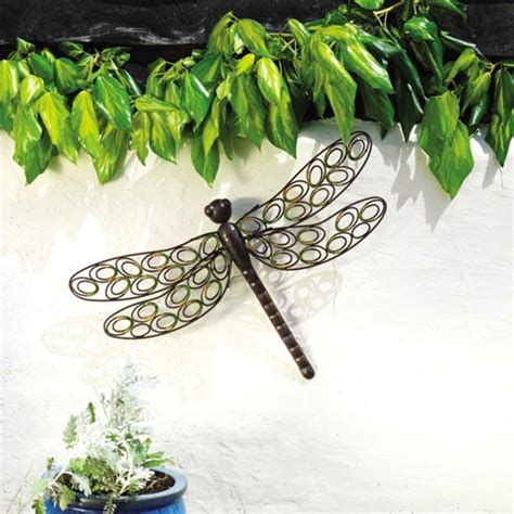 dragonfly metal garden wall art by garden selections | notonthehighstreet.com