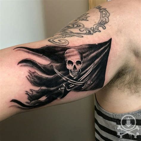 40 pirate flag tattoo designs for men jolly roger ink ideas – Artofit