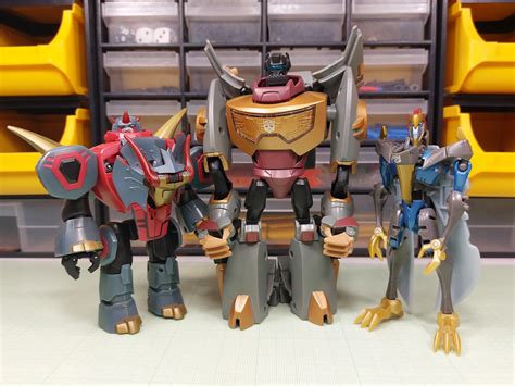 Finally got Animated Grimlock, so the Dinobots are all together once again! : r/transformers