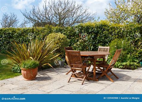 Terrace and Garden Furniture Stock Photo - Image of pavement, table: 125945988