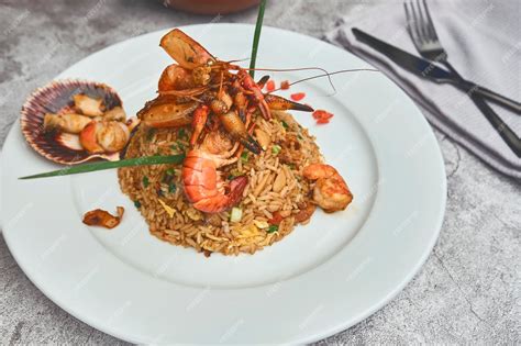 Premium Photo | Peruvian food called arroz chaufa with seafood fried ...