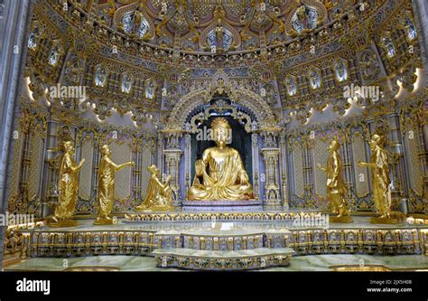 The 3.4m high statue of Swaminarayan inside the Akshardham Mandir temple in New Delhi, India ...