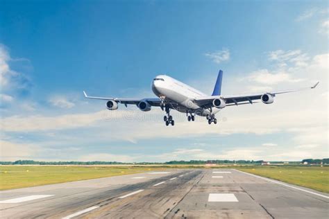 Passenger Airplane is Landing Runway from Airport Morning Flight Stock Photo - Image of landing ...