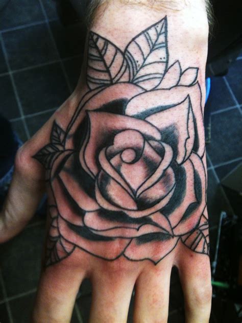 35 Beautiful Hand Tattoo Designs