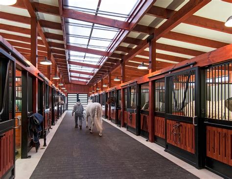 Pegaso Farm blends warm wood, modern metal with natural light for an exquisite equestrian ...